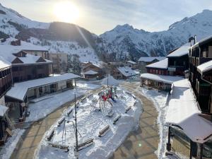 a resort in the mountains with snow on the ground at travelski home classic - Résidence La Muzelle in Les Deux Alpes