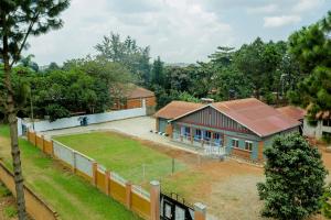 an aerial view of a house with a yard at Perudas Place in Kampala