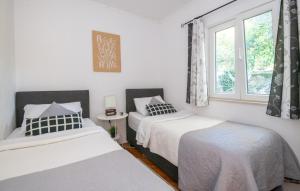 Postel nebo postele na pokoji v ubytování House Rilovic by Villas Guide + 24 fotografií