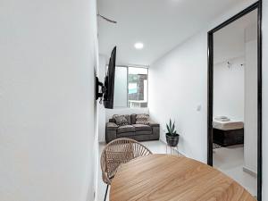 Et opholdsområde på Fee4Me cosy flat near Neomundo