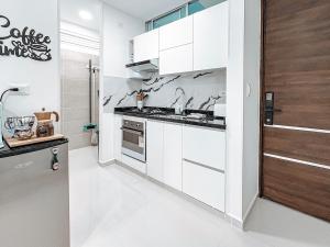 Køkken eller tekøkken på Fee4Me cosy flat near Neomundo + 22 billeder