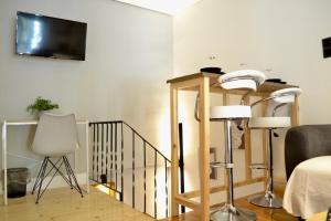 TV/trung tâm giải trí tại Aiolos Sea loft central market Palaio Faliro