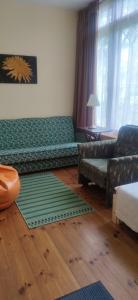 Ένα ή περισσότερα κρεβάτια σε δωμάτιο στο Pumpuri apartment