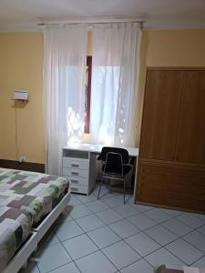 Katil atau katil-katil dalam bilik di Appartamento X Vacanze Ca' Mercati +4 gambar