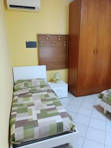 Katil atau katil-katil dalam bilik di Appartamento X Vacanze Ca' Mercati