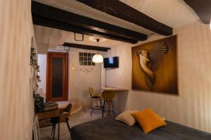 a bedroom with a bed and a painting on the wall at Casa Vacanze Vr Service in Potenza