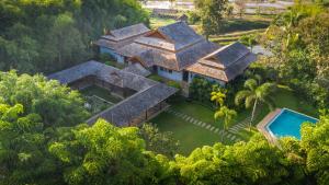 an aerial view of a house in the forest at Pa Sak Tong in Chiang Rai