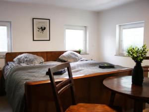 Postel nebo postele na pokoji v ubytování Vineyard cottage Ranč pri Hanzeku