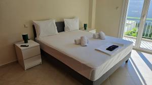 En eller flere senge i et værelse på life is for you Suite!