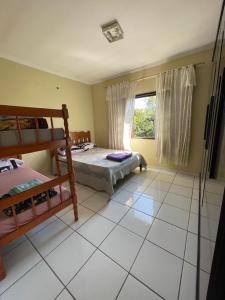Postel nebo postele na pokoji v ubytování Hostel e Pousada Vó Lili