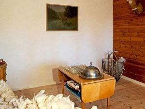 a room with a table with a tea kettle on it at 5 person holiday home in Hagfors in Hagfors