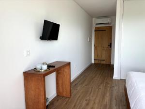 Μια τηλεόραση ή/και κέντρο ψυχαγωγίας στο Paços de Douro - Chambre 4 Charme & Calme