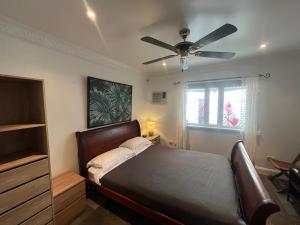 Ένα ή περισσότερα κρεβάτια σε δωμάτιο στο Cairns exclusive apartment