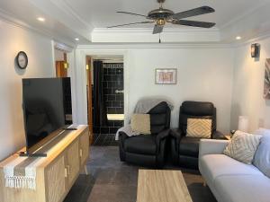 Μια τηλεόραση ή/και κέντρο ψυχαγωγίας στο Cairns exclusive apartment