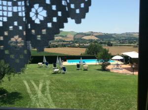 The swimming pool at or close to Il Gallo Del Vicino