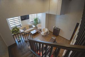 an overhead view of a living room with a couch at Apartmani Astral in Šabac