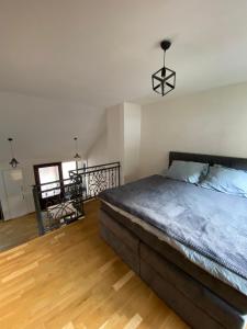 Ένα ή περισσότερα κρεβάτια σε δωμάτιο στο Vares Luxury Apartment