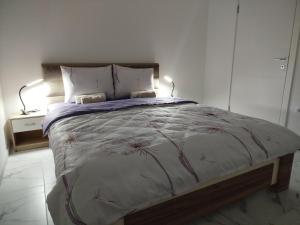 Postel nebo postele na pokoji v ubytování Vista MDD