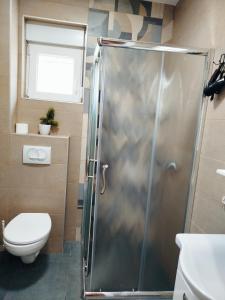 Koupelna v ubytování Vista MDD + 9 fotografií