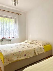 Ένα ή περισσότερα κρεβάτια σε δωμάτιο στο Apartment Green Heaven