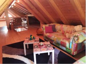 a living room with a couch and a table at Wohnung in Neuhaus nahe Skigebiet Petzen in Neuhaus