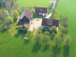 an aerial view of a house in a field at Wohnung in Neuhaus nahe Skigebiet Petzen in Neuhaus