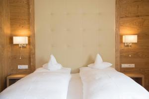 Voodi või voodid majutusasutuse Hotel Rosskopf toas