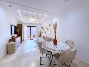 Χώρος καθιστικού στο Charmant Appart , Confort avec balcon et piscine