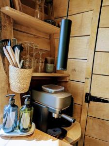 Kuchyň nebo kuchyňský kout v ubytování la pomme de pin Cornesse