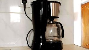 a black blender sitting on top of a counter at Paros Heritage Retreat by ΜΡS in Parikia