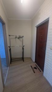an empty room with a closet and a door at 1 кімнатна квартира in Sumy