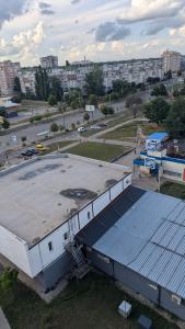 an overhead view of a building with a parking lot at 1 кімнатна квартира in Sumy