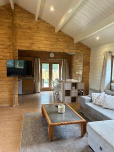 Μια τηλεόραση ή/και κέντρο ψυχαγωγίας στο Chalet Champ'&Bois