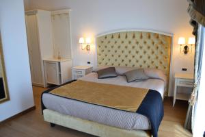 Ένα ή περισσότερα κρεβάτια σε δωμάτιο στο Agriturismo De Luca