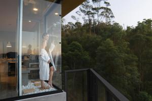 Balkón nebo terasa v ubytování Chalé Boutique - Spa - Sauna seca , Jacuzzi , Rede suspensa