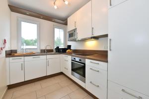 Kuchyň nebo kuchyňský kout v ubytování Ferienhaus Boddenzauber