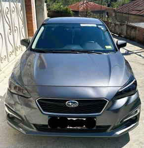 a silverundai genesis car parked in a driveway at SUBARU IMPREZZa in Itʼkhvisi