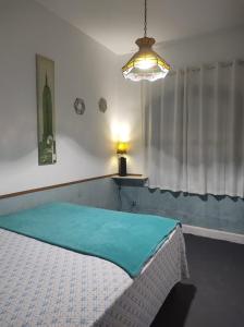 Postel nebo postele na pokoji v ubytování Casa Aloha