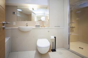 a bathroom with a toilet and a sink and a shower at 2 Bed in Bath oc-bhr9 in Bath +12 photos