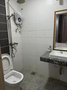 Ένα μπάνιο στο Sumayyah Tulip Quayside Shah Alam - Cozy 4BR Family Stay