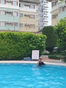 Bazén v ubytování Magoncia Condo Feel at Home and Enjoy Vacation nebo v jeho okolí