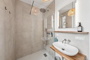 Koupelna v ubytování cruwzo- Moderne & gemütliche Apartments + 39 fotografií