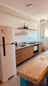 Kuchyň nebo kuchyňský kout v ubytování Apartamento aconchego da serra