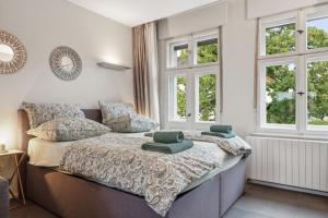 Postel nebo postele na pokoji v ubytování cruwzo- Moderne & gemütliche Apartments