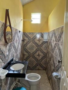 Koupelna v ubytování Chalé do Pedro