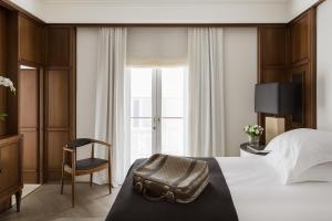 Postel nebo postele na pokoji v ubytování Urban Hotel Tel Aviv