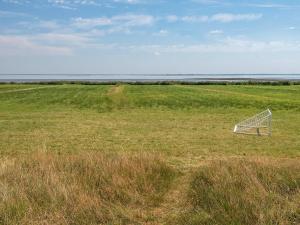 a soccer goal in the middle of a field at 6 person holiday home in Rømø in Tagholm +29 photos
