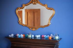 a mirror on top of a table with balls at 1 Bed Cosy Loch Lomond base in Bonhill