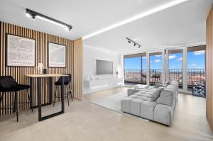 TV a/nebo společenská místnost v ubytování SkyView meets Luxury by CordisSky