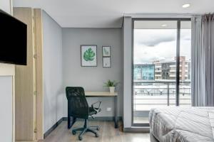 Μια τηλεόραση ή/και κέντρο ψυχαγωγίας στο Apartamento con terraza HS by gA